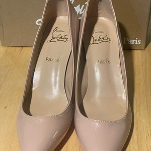 Tan Louboutin heels